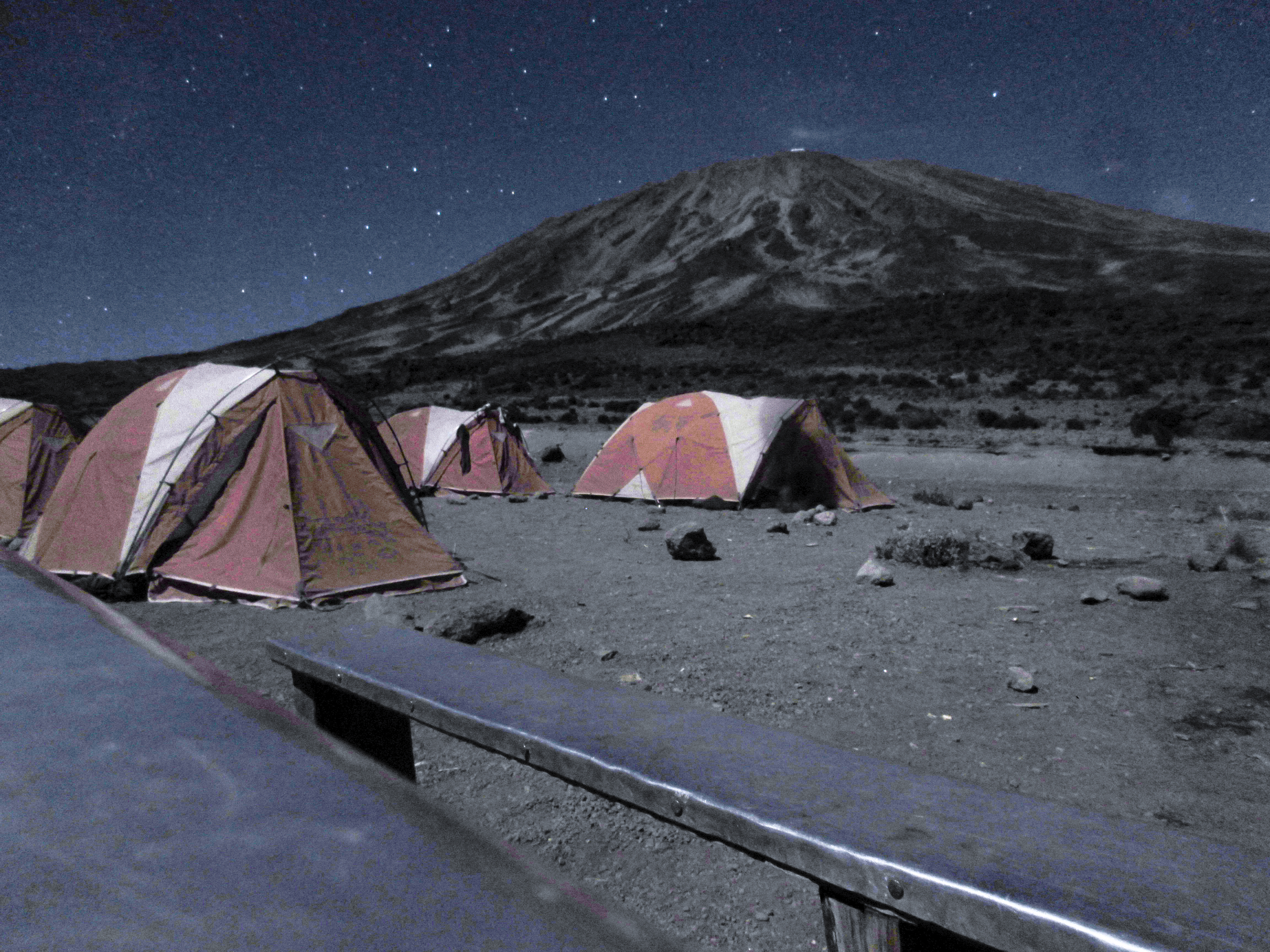 Kibo night view from 3rd Cave camp with ghost - photo by Giovanni Baffa Scinelli